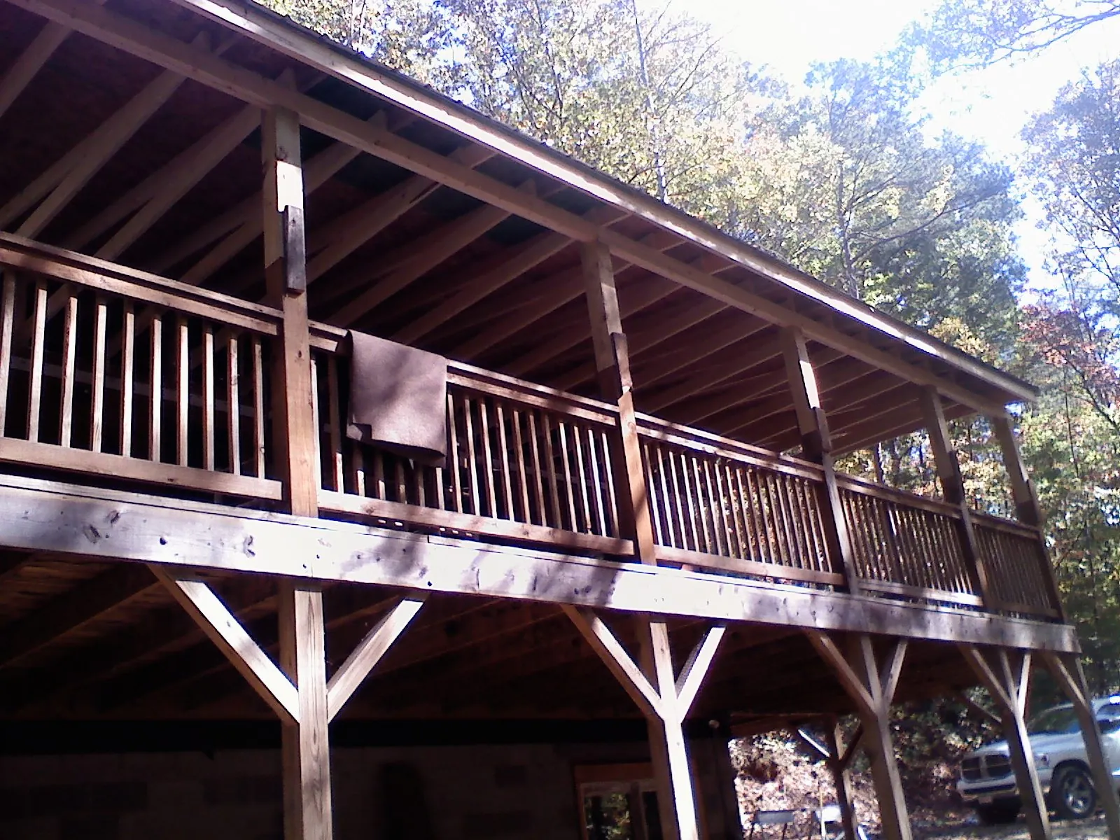 Timber framing under a new elevated porch and deck — Roof Leak Repair in Jacksboro by Roofing Brothers